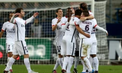 Les Parisiens vainqueurs de  Caen sur sa pelouse au stade Michel d'Ornano, le 19 décembre 2015