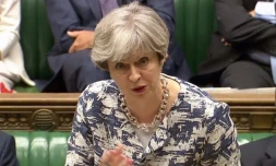 Capture d'écran à partir d'une vidéo de la chaîne parlementaire britannique (PRU) qui montre la Première ministre Theresa May le 26 juin 2017 au Parlement à Londres