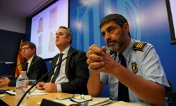 De G à D, le responsable des affaires judiciaires de Catalogne Carles Mundo, de l'Intérieur, Joaquim Forn et le chef de la politique régionale de Catalogne Josep Lluis Trapero le 21 août 2017 lors d'une conférence de presse à Barcelone