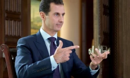 Photo du président syrien Bachar al-Assad pendant une interview à la chaîne danoise TV2, fournie par l'agence officielle syrienne Syrian Arab News Agency (SANA) le 6 octobre 2016