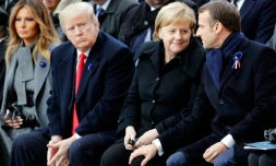 Le président américain Donald Trump, la chancelière allemande Angela Merkel et le président français Emmanuel Macron à Paris le 11 novembre 2018