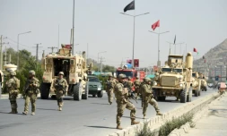 Des forces de sécurité afghanes et des soldats américains, le 24 septembre 2017 à Kaboul