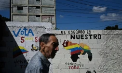 Une fresque murale faisant campagne pour l'annexion de la région de l'Essequibo administrée par le Guyana, le 28 novembre 2023 à Caracas, au Venezuela