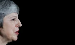 Theresa May doit convaincre le Parlement britannique qui votera en décembre pour ou contre le projet d'accord élaboré avec l'Union européenne mardi (photo prise lors de sa déclaration à la presse le 14 novembre 2018 à Londres)