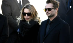 La fille de Johnny Hallyday Laura Smet et son fils David Hallyday aux funérailles de leur pÚre à La Madeleine à Paris, le 9 décembre 2017
