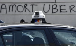 Une inscription "mort à Uber" sur un mur près de la Porte Maillot à Paris, le 25 juin 2015