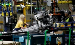 Des employés de General Motors dans une usine de la ville de Flint, dans le Michigan, le 12 juin 2019