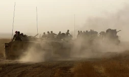 Les forces armées irakiennes avancent vers la localité d'Al-Chargat, le 21 septembre 2017, lors de l'offensive contre les fiefs de l'EI