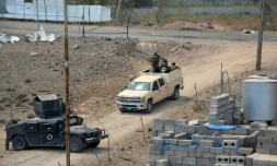 L'armée irakienne prend position dans le centre-ville de Qayyarah, dans le nord de l'Irak, le 24 août 2016