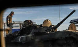 Un soldat ukrainien sur un char à Kharkiv le 9 septembre 2022