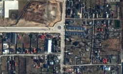 Image satellite publiée le 4 avril 2022 par la société américaine Maxar Technologies et montrant une vue de la rue Iablonska dans la ville ukrainienne de Boutcha, au nord-ouest de Kiev, le 19 mars 2022