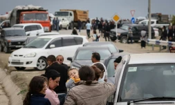 Des réfugiés du Nagorny Karabakh arrivent à un centre d'accueil près de Kornidzor, le 25 septembre 2023 en Arménie