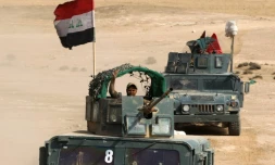 Des membres des forces irakiennes, le 27 octobre 2016 près d'un village au sud de Mossoul