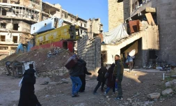 Des habitants d'Alep, en Syrie,  fuient les violences, le 7 décembre 2016