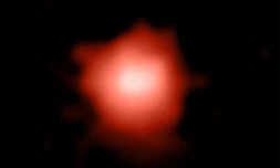 Image composite communiquée par l'Institut Niels Bohr de la GLASS-z13 observée par le télescope spatial James Webb, la plus distante jamais vue 