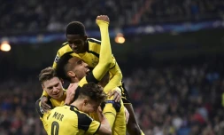 Les joueurs du Borussia Dortmund célèbrent leur égalisation face au Real, le 7 décembre 2016 à Madrid