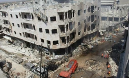 Vue d'immeubles détruits après des raids aériens, le 12 juin 2016 à Idleb (nord-ouest)