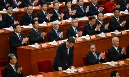 Le président chinois Xi Jinping s'incline lors de la cérémonie d'ouverture de la Conférence consultative politique du peuple chinois, le 4 mars 2024 à Pékin