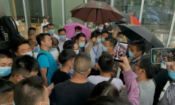 Rassemblement de propriétaires spoliés devant le siège du groupe immobilier Evergrande à Pékin, le 14 septembre 2021