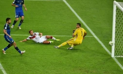L'Allemand Mario Götze (c) inscrit l'unique but face à l'Argentine en finale du Mondial 2014, le 13 juillet 2014 à Rio de Janeiro