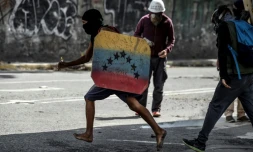 Des opposants lors d'une manifestation anti-Maduro à Caracas, le 6 juillet 2017 au Venezuela