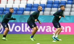 Les footballeurs italiens Marco Verratti, Leonardo Bonucci et Jorginho lors d'une séance d'entraînement au stade Allianz Arena de Munich (Allemagne) le 1 er juillet 2021