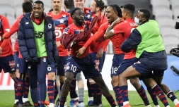 La joie des joueurs de Lille aprÚs leur victoire sur Lyon lors du match de Ligue 1 à Décines-Charpieu, le 25 avril 2021