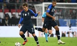 Les attaquants de l'équipe de France Antoine Griezmann (g) et Kylian Mbappé face à l'Allemagne en Ligue des nations, le 6 septembre 2018 à Munich 