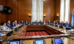 La table des discussions lors du précédent round de négociations le 16 mai 2017 à Genève