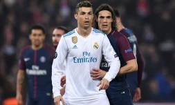 Cristiano Ronaldo (g) du Real Madrid et Edinson Cavani (d) du PSG, lors du match de l'UEFA au Parc des Princes le 6 mars 2018