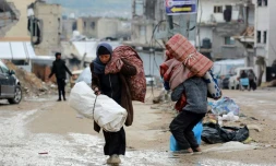 Des Palestiniens fuient Beit Lahia, dans le nord de la bande de Gaza, le 21 mars 2025