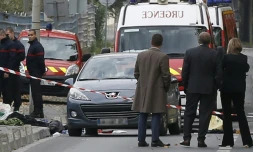 Des officiers de police à l'Ile-Saint-Denis le 5 octobre 2015 après un braquage