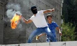 Un Palestinien lors de heurts avec les forces de sécurité israéliennes le 18 septembre 2015 à Hébron 