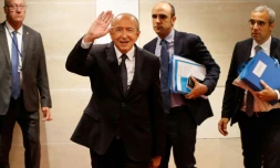 Le ministre de l'Intérieur français Gérard Collomb arrive à son audition devant la commission d'enquête de l'Assemblée nationale sur l'affaire Benalla, le 23 juillet 2018