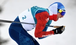 Le fondeur français Maurice Manificat (g) lors du 15 km + 15 km classique de skiathlon aux JO, le 11 février 2018 à Pyeongchang