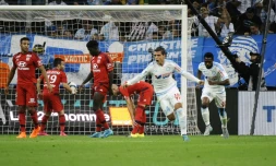 Le défenseur Karim Rekik (N.4) après avoir signé l'égalisation pour Marseille face à Lyon, le 20 septembre 2015 au Vélodrome