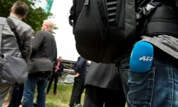 Reporter de l'Agence France-Presse TV lors d'une conférence de presse à Berlin le 3 juin 2014