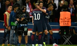 Le trio du PSG Neymar, Edinson Cavani et Kylian Mbappé après un but contre le Bayern Munich, le 27 septembre 2017 au Parc des Princes