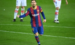L'avant-centre argentin du Barça Lionel Messi, aprÚs l'un de ses deux buts marqués contre le Deportivo Alaves, au Camp Nou, le 13 février 2021 en championnat d'Espagne