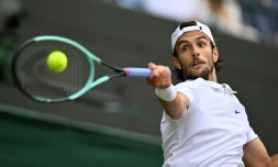 L'Italien Lorenzo Musetti lors de son quart de finale victorieux face à l'Américain Taylor Fritz, le 10 juillet 2024 à Wimbledon