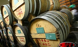 Mardi 15 juillet 2003, usine de Bois Rouge - Le rhum, l'un des produits nobles de la canne, est entreprosé en fûts de vieillissement sur le sitede la distillerie de Savannah à Bois Rouge
