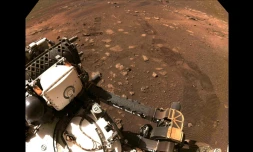Image fournie par la Nasa le 5 mars 2021 montrant les traces de roues du rover Perseverance qui s'est déplacé de quelques mÚtres sur Mars