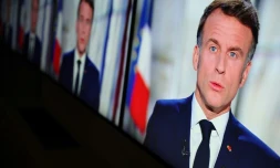 Capture d'écran du président français Emmanuel Macron lors de ses voeux pour le Nouvel An depuis le palais de l'Elysée, Paris, le 31 décembre 2024