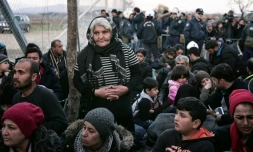 Des migrants le 2 mars 2016 prÚs d'Idomeni à la frontiÚre entre la GrÚce et la Macédoine