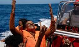 Des migrants secourus par l'ONG espagnole Proactiva Open Arms alors en Méditerranée au large des cÎtes libyennes le 3 août 2023