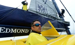 Les skippers français Franck Cammas et Charles Caudrelier à bord du "Maxi Edmond de Rothschild", le 18 juillet 2019 au large de Lorient