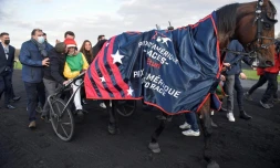 Le trotteur français Davidson du Pont drivé par Nicolas Bazire a remporté  le 101e Prix d'Amérique, l'hippodrome de Paris-Vincennes, le 30 janvier 2022