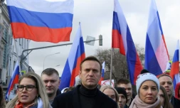 L'opposant russe Alexeï Navalny et son épouse Youlia participent à une marche en mémoire d'un détracteur du Kremlin à Moscou, le 29 février 2020