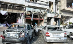 Photo remise par l'agence de presse officielle syrienne, Sana, montrant les suites d'un double attentat suicide à Homs, le 26 janvier 2016