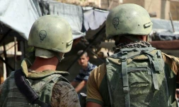 Des soldats russes dans une rue de Deir Ezzor en Syrie, le 15 septembre 2017